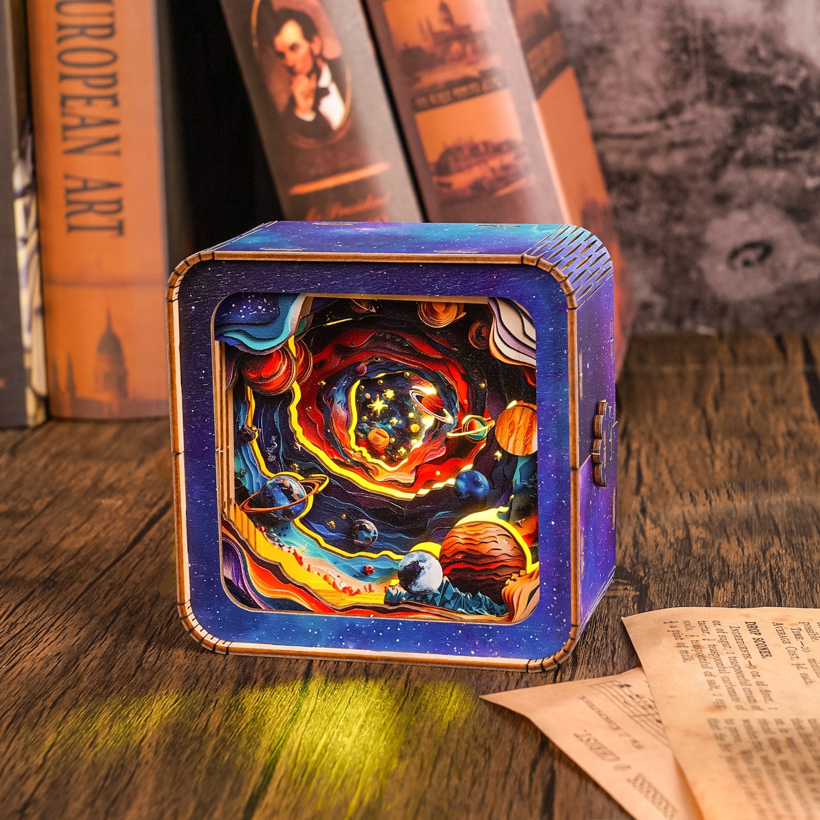 Cosmic Odyssey Kit 3D wooden puzzle night light showcasing a vibrant space design with planets and swirling galaxies.