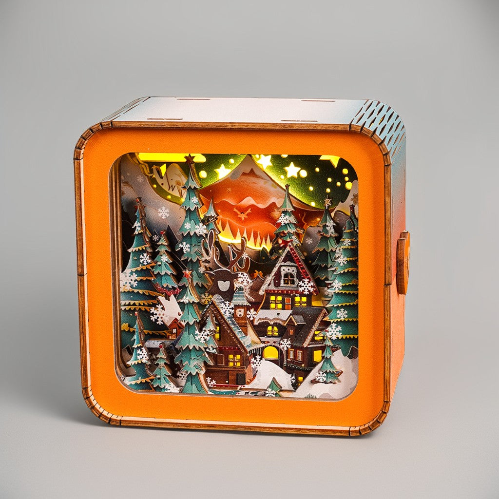 3D wooden puzzle night light featuring a cozy winter scene with trees, mountains, and a charming cabin.