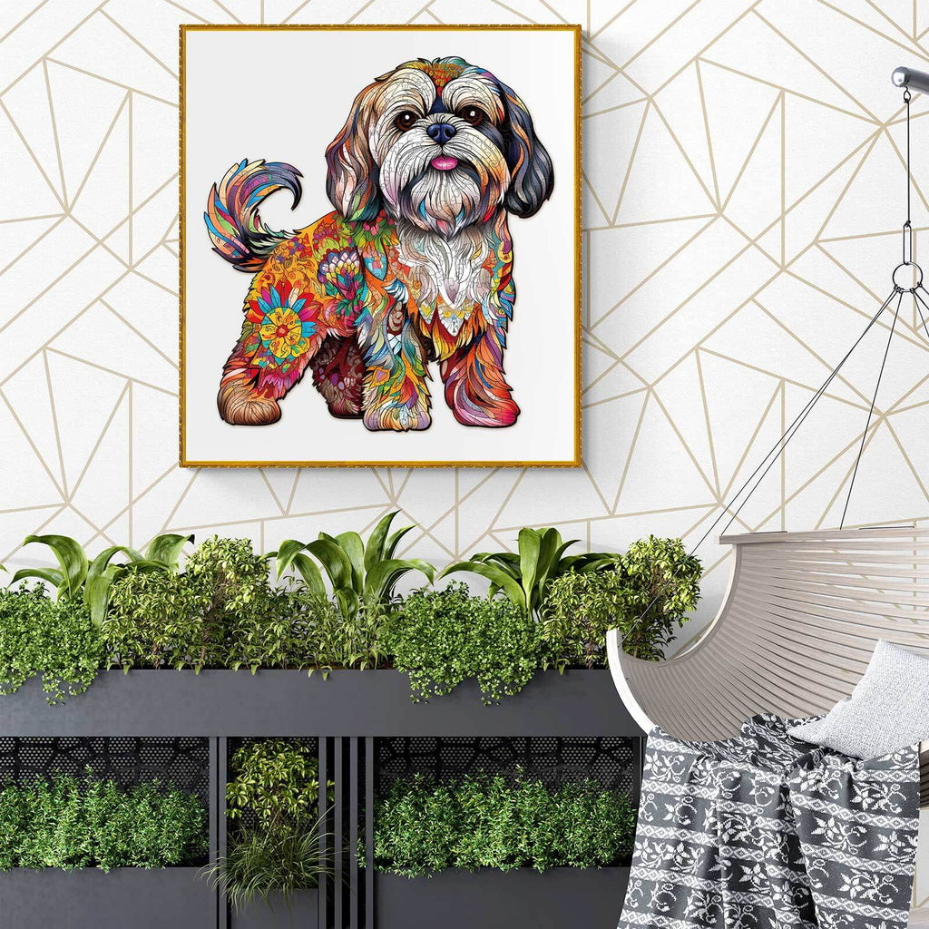 Colorful Shih Tzu artwork displayed on a wall among indoor plants and modern decor.