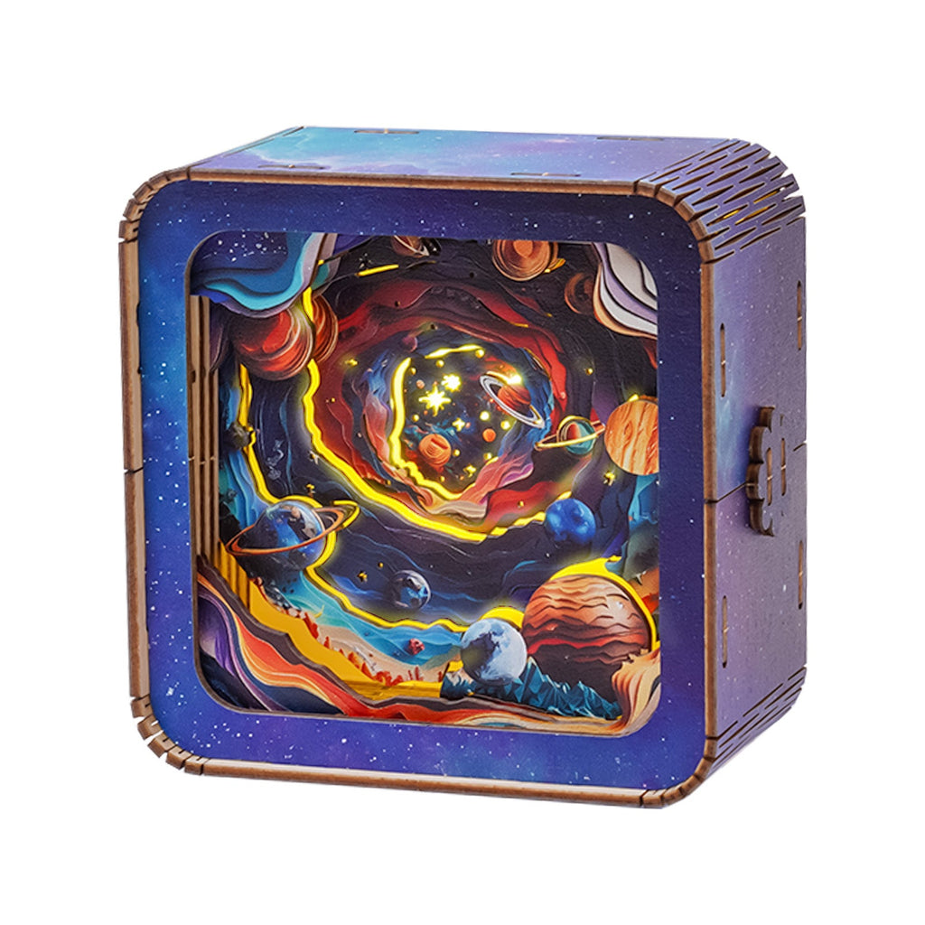 3D wooden puzzle night light featuring a colorful cosmic design with planets and swirling galaxies.