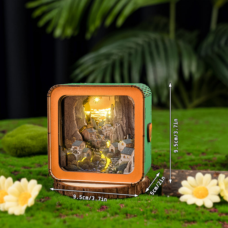 Valley Village Kit 3D wooden puzzle night light showcasing a serene landscape with mountains and a soft glowing effect.