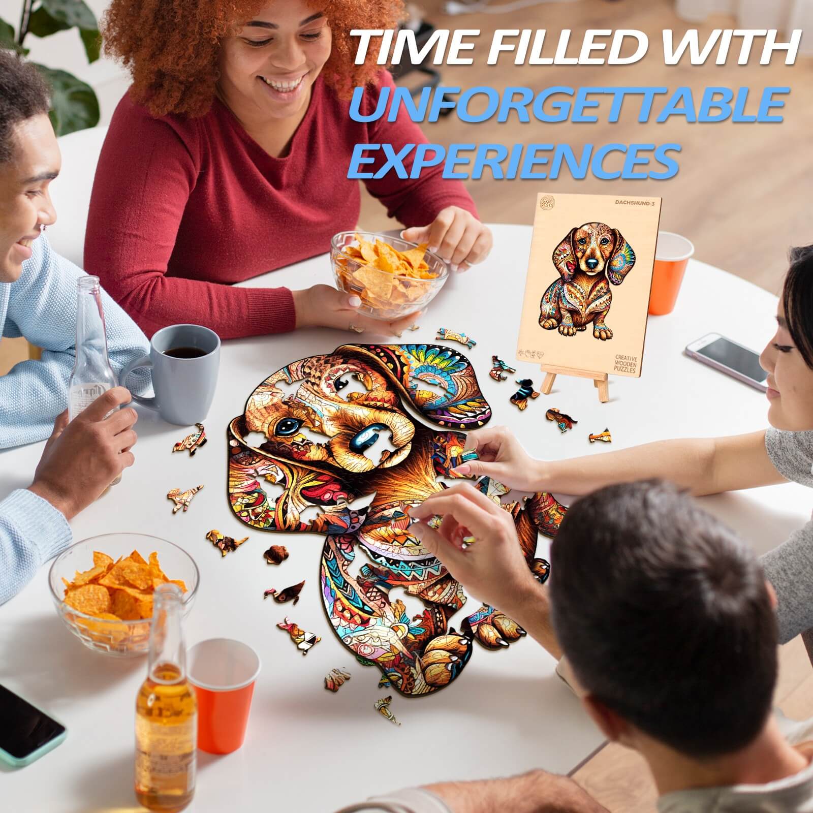 Friends enjoying a colorful Dachshund wooden jigsaw puzzle at a table with snacks and drinks.