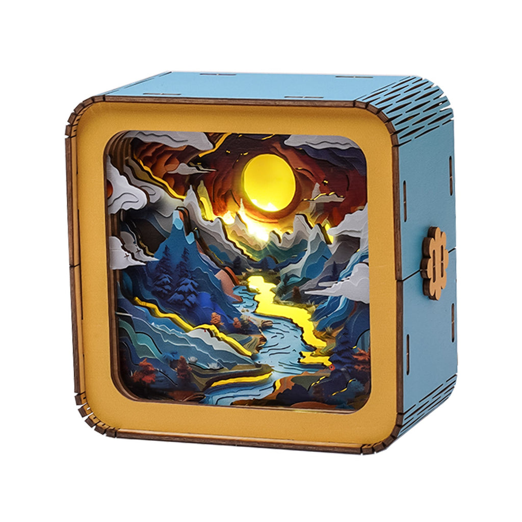 3D wooden puzzle night light showcasing a mountain landscape with a glowing sun and river, perfect for home decor.