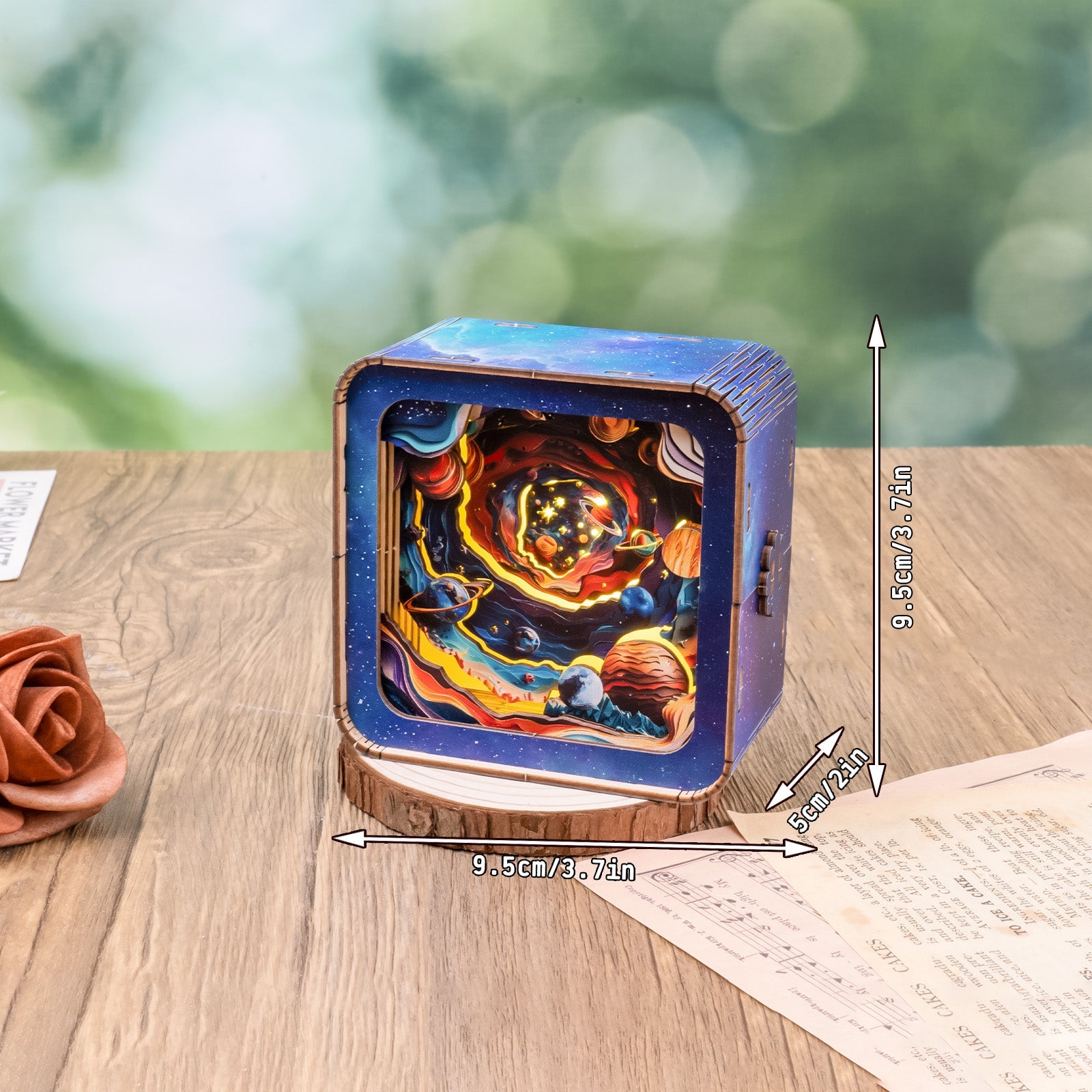 Cosmic Odyssey Kit 3D wooden puzzle night light displaying a colorful cosmic design with measurement indicators.