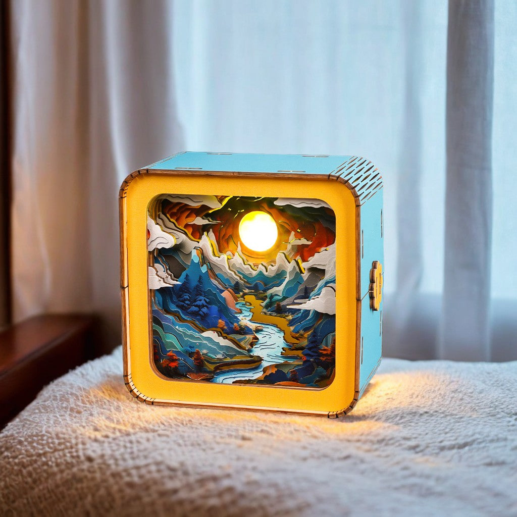 Moonlit Mountain Kit 3D wooden puzzle night light featuring a vibrant mountain scene, softly illuminated.