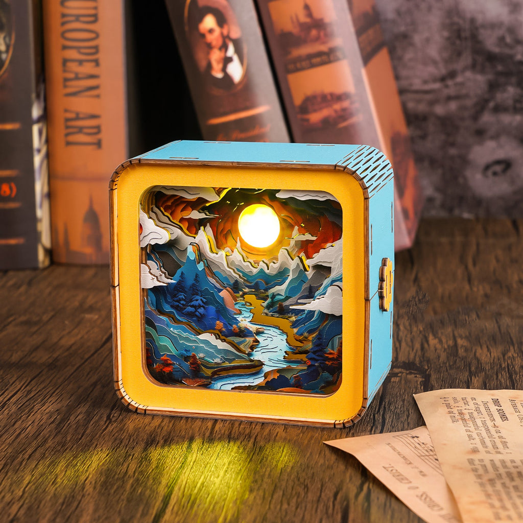 Moonlit Mountain 3D wooden puzzle night light displaying intricate mountain and river design, illuminated from within.