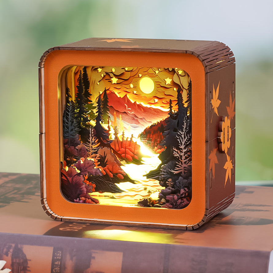 Forest Sunset 3D wooden puzzle night light showcasing a glowing landscape with trees, mountains, and a vibrant sunset.