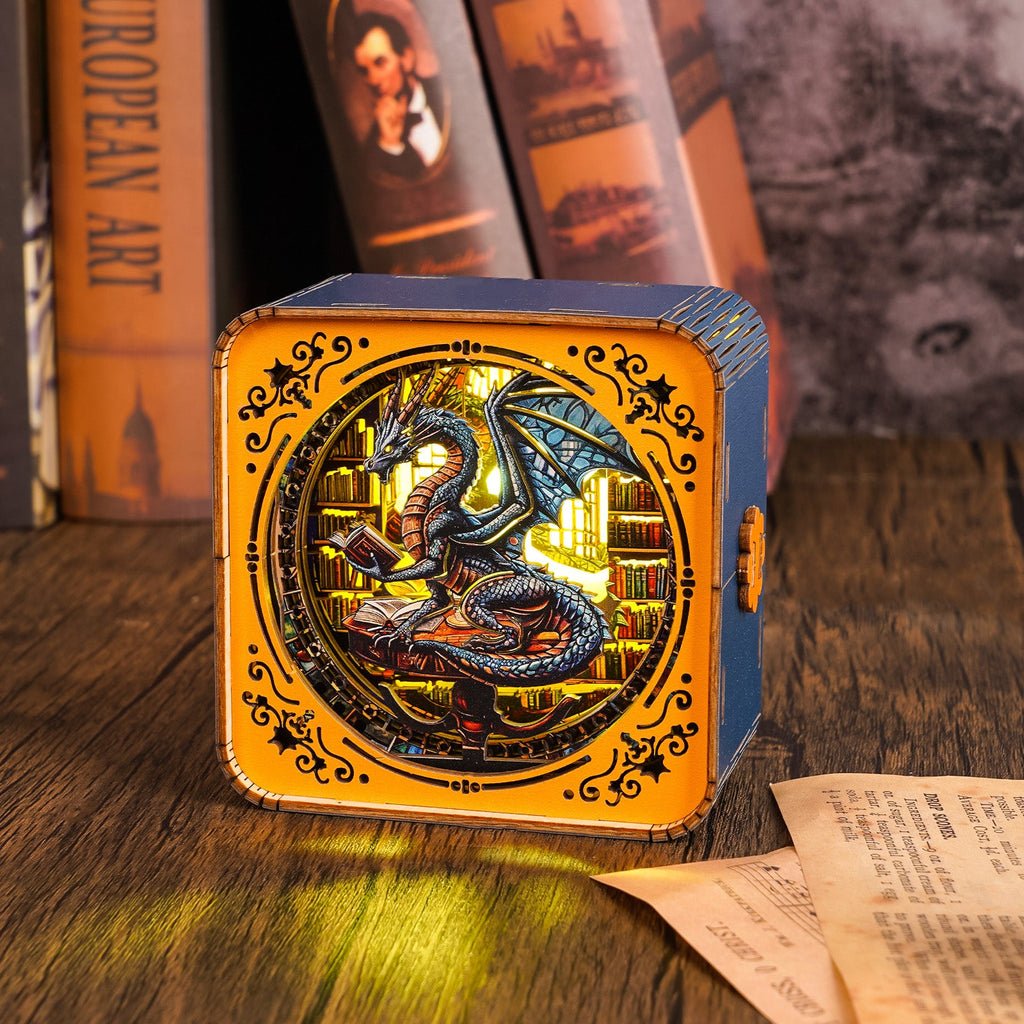 3D wooden puzzle night light featuring a dragon surrounded by books on a wooden table with vintage books in the background.