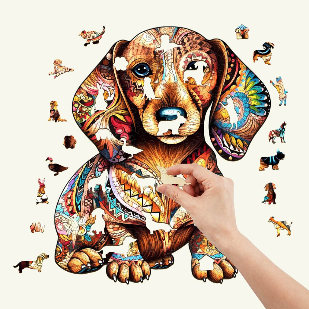 Colorful Dachshund-shaped wooden jigsaw puzzle with unique animal and floral pieces, showcasing vibrant designs.